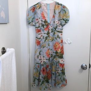 Floral dress size S with buttons at front
